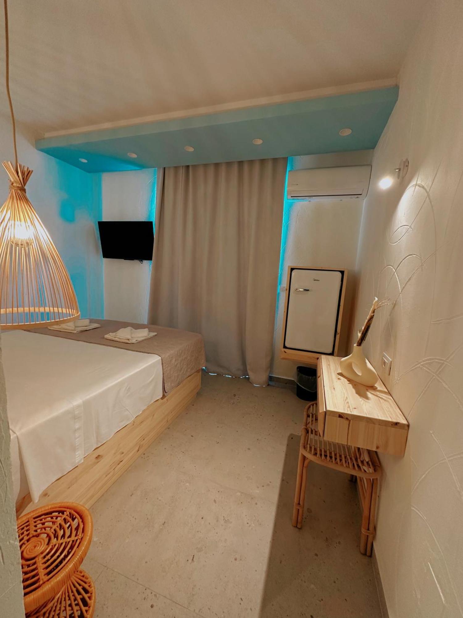 Delfini Beach Hotel & Suites Архангелос Экстерьер фото