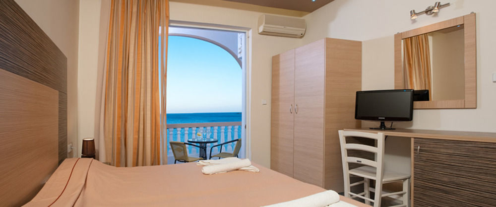 Delfini Beach Hotel & Suites Архангелос Экстерьер фото